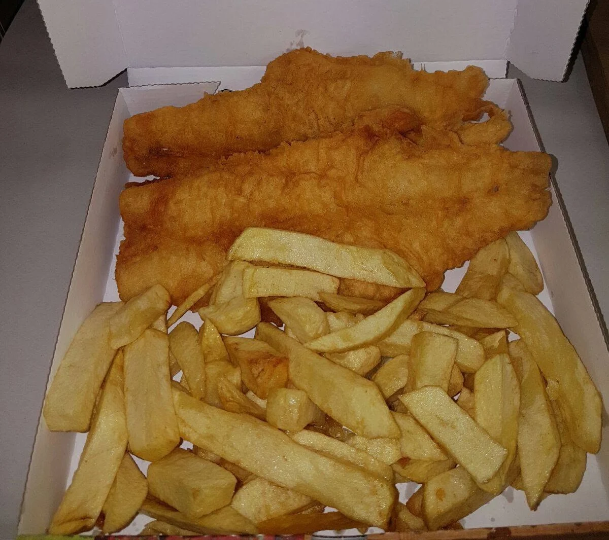 Crispy Fish & Chips Served at Ali's Takeaway in Pennywell